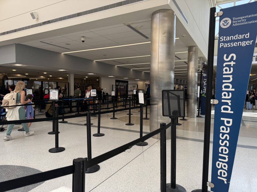 Dayton's TSA agents have been showing up to work to keep lines moving at Dayton International Airport, despite missing two and a half paychecks.