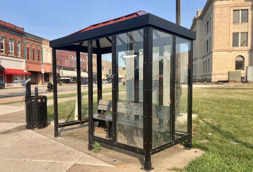 The graffiti-marked shelter at CityLink's downtown Pekin bus stop in front of the Tazewell County Courthouse was empty early Tuesday evening, but cigarette butts and a cell phone littered the ground.