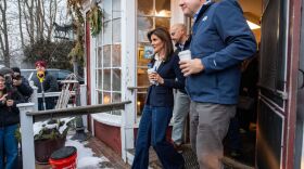 Former UN Ambassador and 2024 presidential hopeful Nikki Haley and New Hampshire Governor Chris Sununu (R) exit Newfields Country Store after a get-out-the-vote campaign stop in Newfields, New Hampshire.