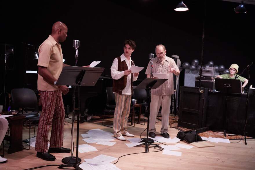 Actors Dathan Hooper, Matt Street, and Jon Huffman perform "Night of the Living Dead" before a studio audience. Laura Ellis performs Foley sound effects.