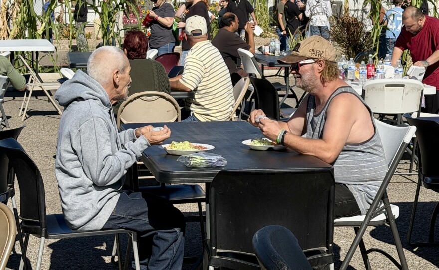 Volunteers serve meals at the Crossroads Rescue Mission's three days of Thanksgiving on November 25, 2025.