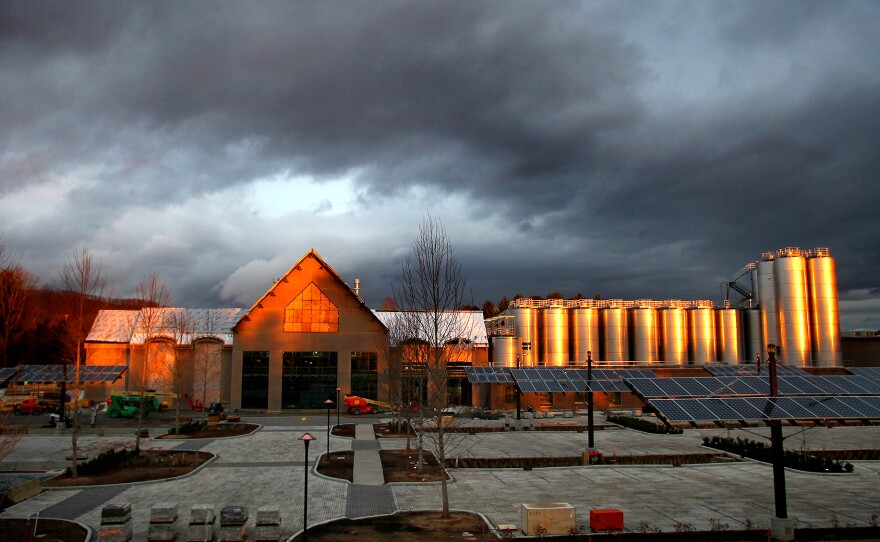 Sierra Nevada's brewery in Mills River, N.C., aglow in early morning light in December 2013. The company was attracted to the Asheville area because it offers access to good water for brewing and the outdoors for employee recreation.