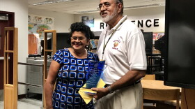 Boodnaraine Tihal, right, poses with his wife after the Broward Teacher's Union honored him with a plaque at Seminole Middle School Tuesday.