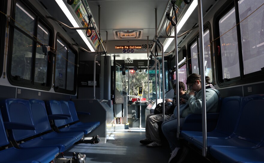 Santa Fe College students ride RTS route 76, driven by RTS Bus Driver Edward Hines, in Gainesville, Fla. on Thursday, Nov. 13, 2025.