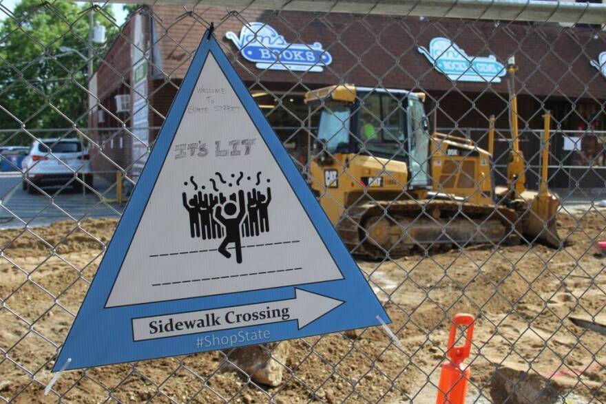 A sign telling pedestrians how to cross construction to access local businesses got some original artwork along West Lafayette's State Street.