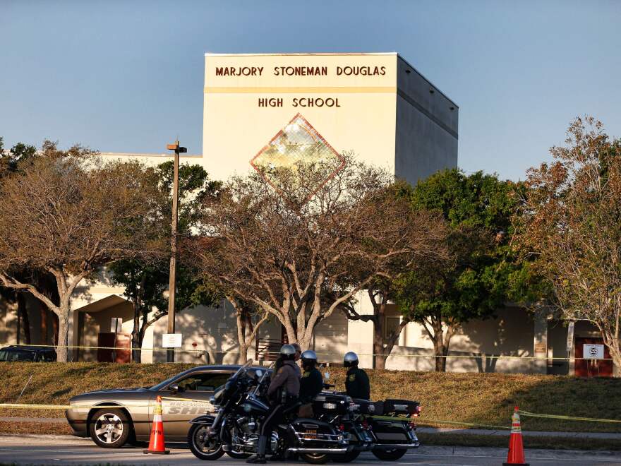 Broward County Sheriff officers stand outside Marjory Stoneman Douglas High School in Parkland, Fla., on Feb. 27, 2018.