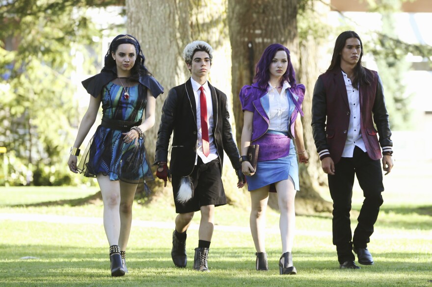 Sofia Carson (from left), Cameron Boyce, Dove Cameron and Booboo Stewart star as the next generation of Disney villains in <em>Descendants.</em>