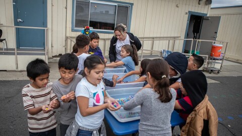 Students being taught a science lesson outside of the classroom at the Keyes Elementary School in Keyes on Nov. 15, 2023.