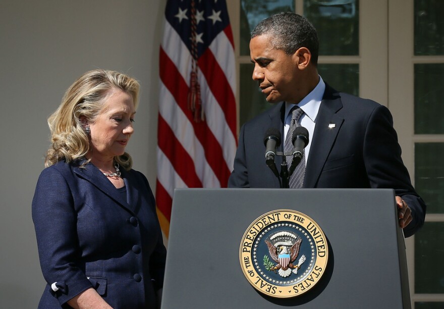 President Obama responds to the attack at the U.S. Consulate in Benghazi as Secretary of State Hillary Clinton looks on in the Rose Garden of the White House on Sept. 12.