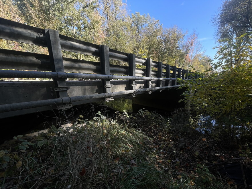 A road side view of Saline's Maple Road Bridge (aka the Troll Bridge).