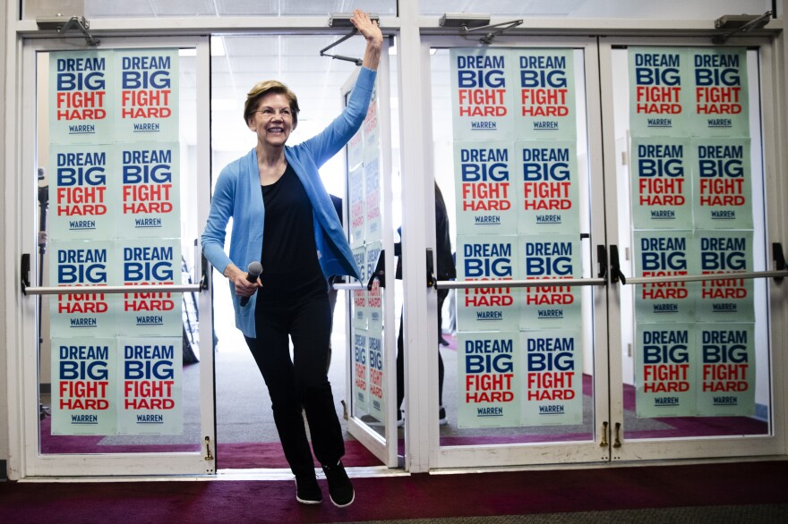 Sen. Elizabeth Warren waves to supporters and volunteers during her presidential run in February.