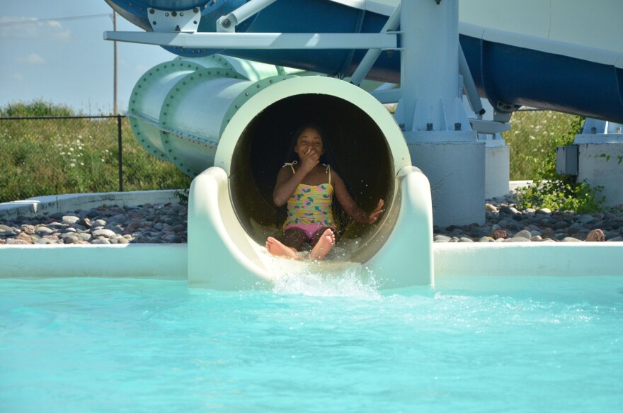 Jada has been coming to The Springs Aquatic Center for the last three years with her dad. Her favorite part is going on the water slide, especially the faster green one.