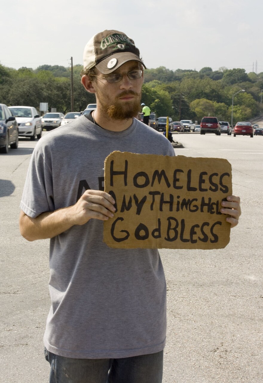 A Man Asks For Donations on the Street