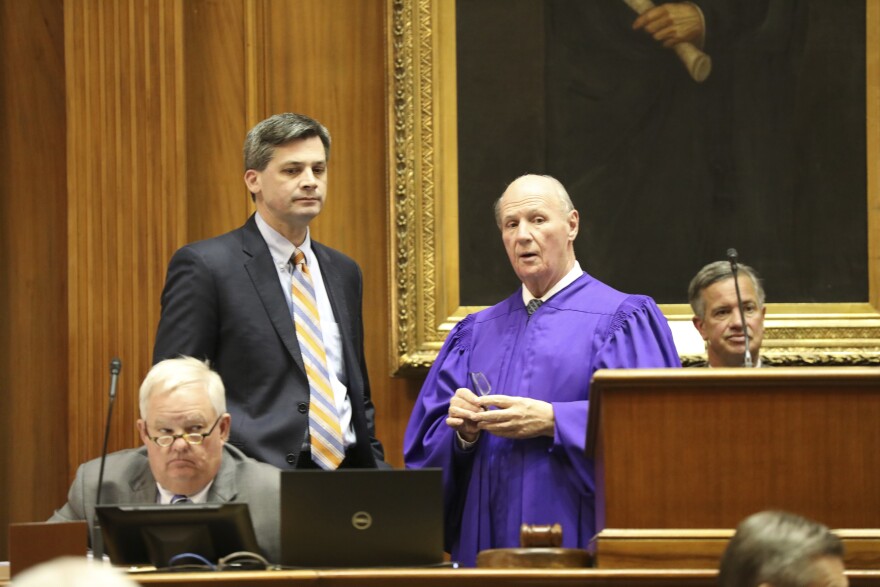 South Carolina Senate Majority Leader Shane Massey, R-Edgefield, left, and Senate President Thomas Alexander, R-Walhalla, right, talk during the Senate's budget debate on Wednesday, April 24, 2024, in Columbia, South Carolina. (AP Photo/Jeffrey Collins)