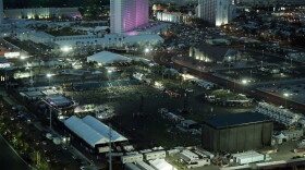 The festival grounds across the street from the Mandalay Bay resort and casino, where a mass shooting occurred, is seen at nighttime Tuesday, Oct. 3, 2017, in Las Vegas. Authorities said Stephen Craig Paddock broke windows at the resort and began firing with a cache of weapons Sunday, killing dozens and injuring hundreds at a music festival. (Marcio Jose Sanchez/AP)