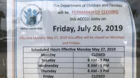 A sign posted on the Port Richey Department of Children and Families access office in Port Richey in July.