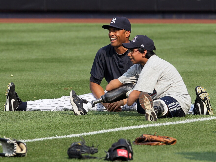 At last year's HOPE Week, pitcher Mariano Rivera warmed up with Jorge Grajales before the New York Yankees played the Detroit Tigers. Grajales threw out the game's first pitch.