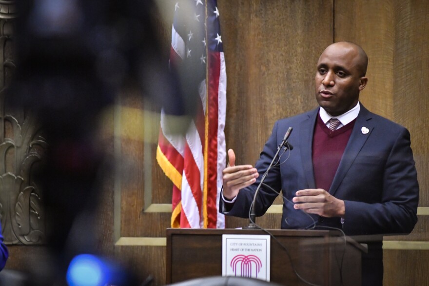 Kansas City Mayor Quinton Lucas announces a loosening of COVID restrictions due to falling rates of COVID infections during a press conferences at City Hall on Friday.