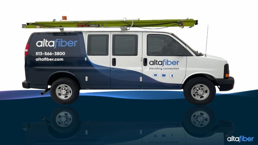 promotional image of a work van with altafiber branding