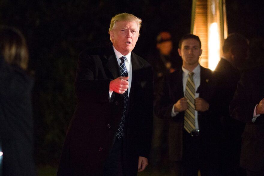 US President-elect Donald Trump arrives to attend a Villains and Heroes themed costume party on Dec. 3, 2016 on Long Island, N.Y., reportedly hosted by some of his biggest donors. (Eduardo Munoz Alvarez/AFP/Getty Images)