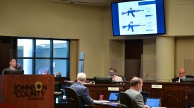 During Thursday's Johnson County Commission meeting, Stillwell resident Matt Keys describes how his home was hit by bullets from an AK-47 and an AK-15 earlier this year.
