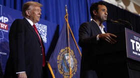 Republican presidential candidate former President Donald Trump listens as former candidate Vivek Ramaswamy speaks at a campaign event in Atkinson, N.H., Tuesday, Jan. 16, 2024. (AP Photo/Matt Rourke)