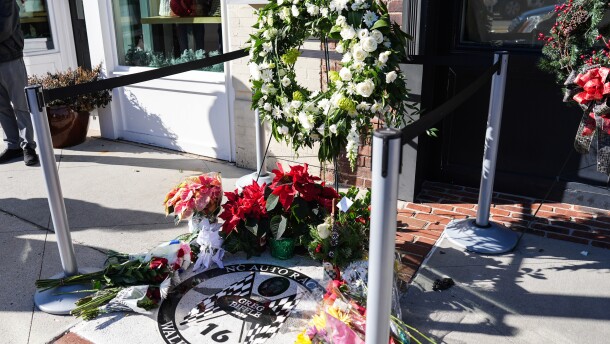 Flowers are displayed at the NC Auto Racing Walk of Fame for Greg Biffle, Friday, Dec. 19, 2025, in Mooresville, N.C.