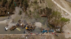 Community members visit Louise Hays Park in Kerrville to look at the damage left behind by the deadly Fourth of July flood in Kerr County on July 5, 2025.