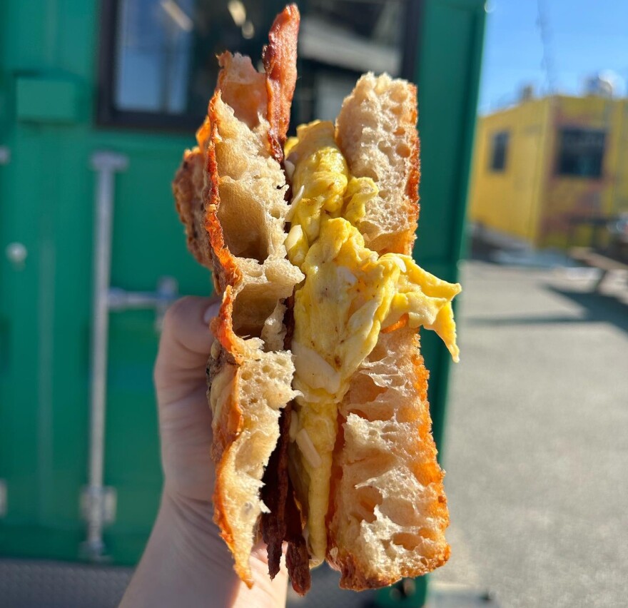 The Sourdough Shack's breakfast sandwich features cheesy garlic focaccia, fluffy egg, Asiago cheese and thick-cut bacon.