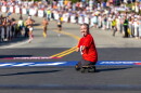 Chris Koch crossing the finish line at the Falmouth Road Race.