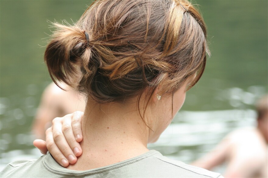 If you reach around and prod your shoulder blades, will you find a spot of sensitive soreness?