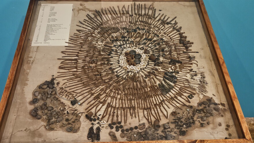 Over 1,000 non-food items were removed from deceased patient Sally Roper's stomach at the St. Joseph State Hospital in 1910. The physician who conducted her autopsy carefully collected the objects, arranged them into a mosaic and hung it on the wall of his lab. It's now on display at the Glore Psychiatric Museum.