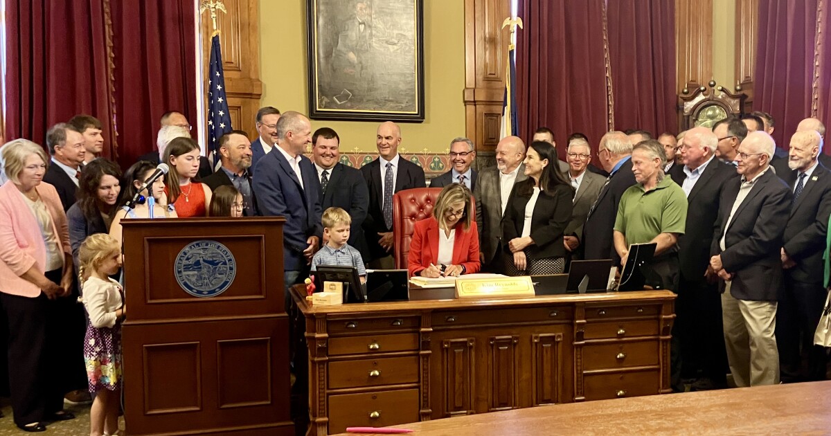 Reynolds signs ‘Iowa Farm Act’ and funding bill for ag and water quality programs
