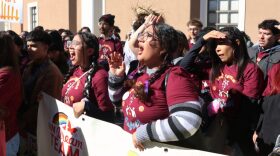 Right: New Mexico Dream Team President Brenda Vara, 20, and Arelie Garcia, 19, celebrate the passage of the Immigrant Safety Act, which was signed into law on Feb. 5, 2026.