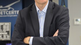 Jared Young(cq) converses with journalists before an interview Thursday, Oct. 3, 2024 at the Columbia Jet Center at Columbia Regional Airport in Columbia. “If I was in the House as an Independent, I wouldn’t be able to do much- I’d just get squashed,” Young said during the interview. “But in the Senate, every single individual Senator wields tremendous power. [Independent Senators] are involved in every decision that’s made in the Senate.”