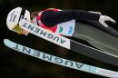 Annika Malacinski of the United States soars through the air during the women's individual compact NH 5km competition at the Nordic Combined World Cup in Ramsau, Austria, Saturday, Dec.16, 2023.