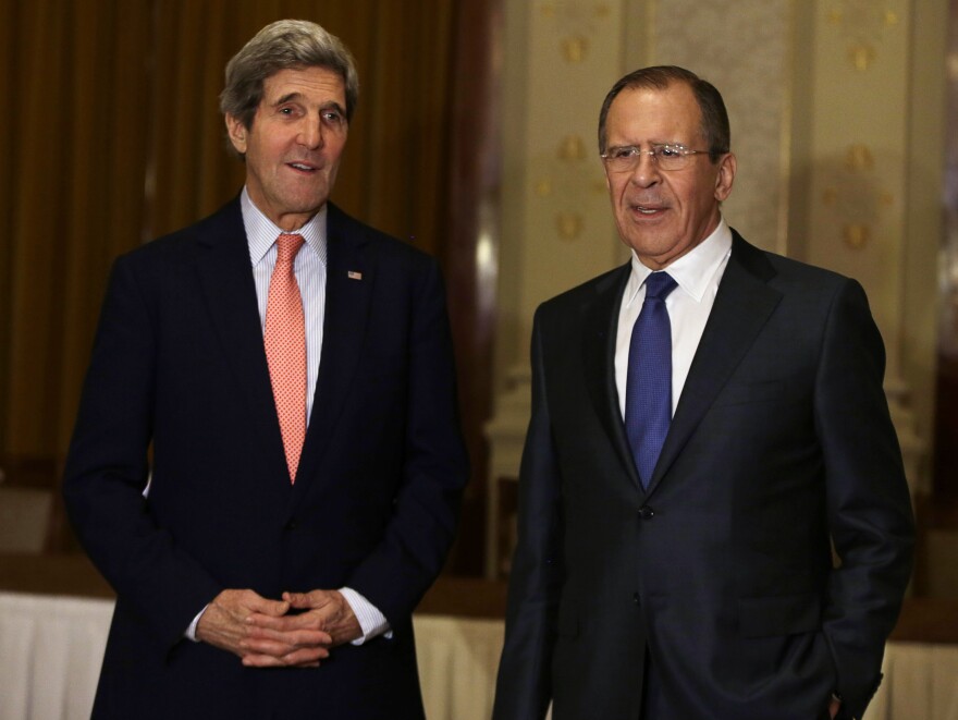 Secretary of State John Kerry (left) meets Russia's Foreign Minister Sergey Lavrov in Montreux, Switzerland, on Tuesday, a day before the start of a major Syrian peace conference that 40 countries will attend.