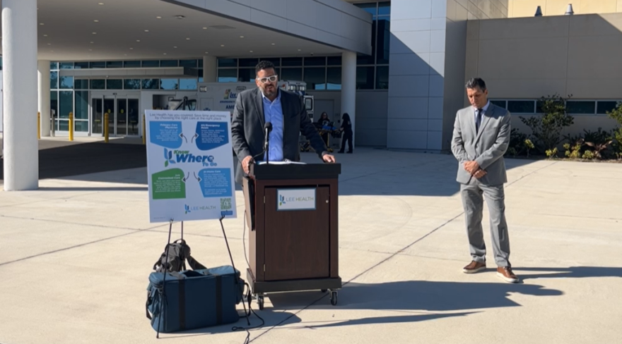 Lee Health Chief Officer for Hospital Operations Armando Llechu and Chief Medical Officer Dr. Iahn Gonsenhauser speak at a press conference, Jan. 11 outside the Emergency Department ambulance bay at Gulf Coast Medical Center