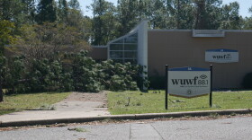 A fallen pine blocks the walkway outside WUWF's studios on the University of West Florida campus after Hurricane Isaias. The tree narrowly missed the building, according for UWF President, Manny Diaz Jr.