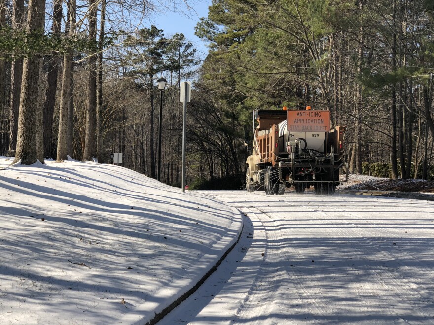 A Chapel Hill municipal truck sprays ant-icing on the streets Thursday afternoon.