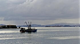 Fishing boat going out to sea. (Photo: Gruscana/ Oscar’s Dock and Boats of Kodiak/flickr)