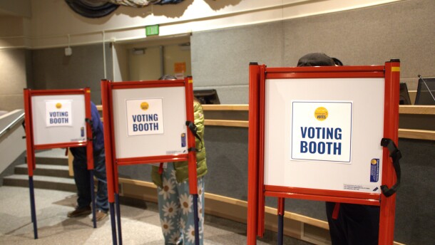 Anchorage voters in voting booths