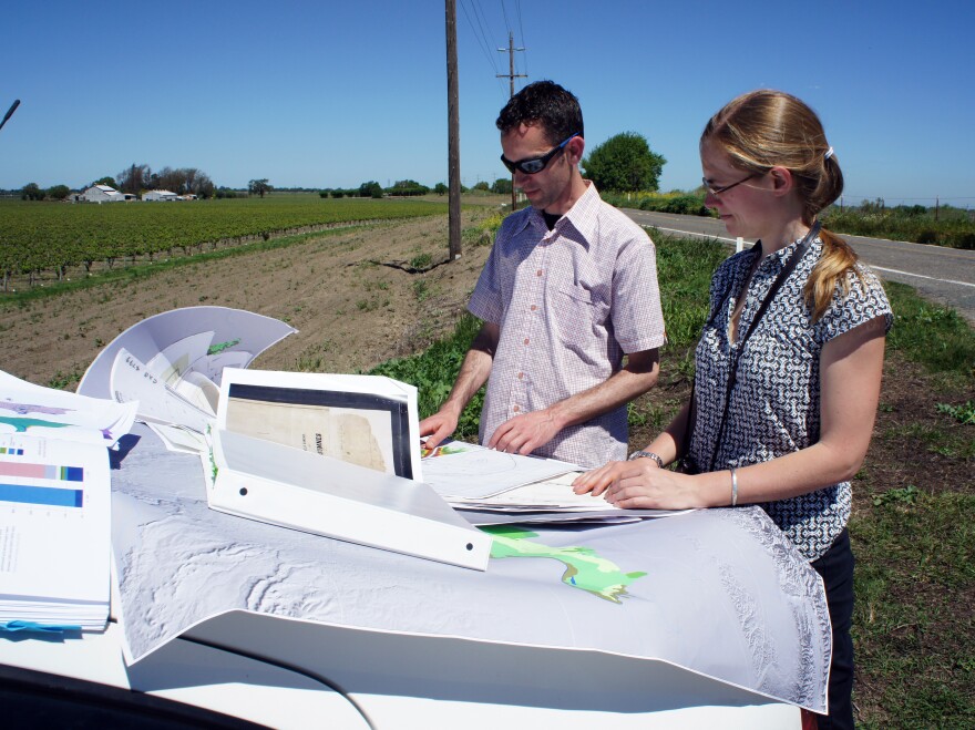 Historical ecologists Alison Whipple and Robin Grossinger study maps in California's delta, just east of San Francisco Bay.