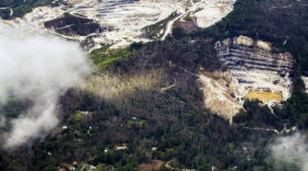 An aerial view of quartz mines in Spruce Pine, N.C., as taken from a plane on Monday, Sept. 30, 2024. (AP Photo/Gary D. Robertson)