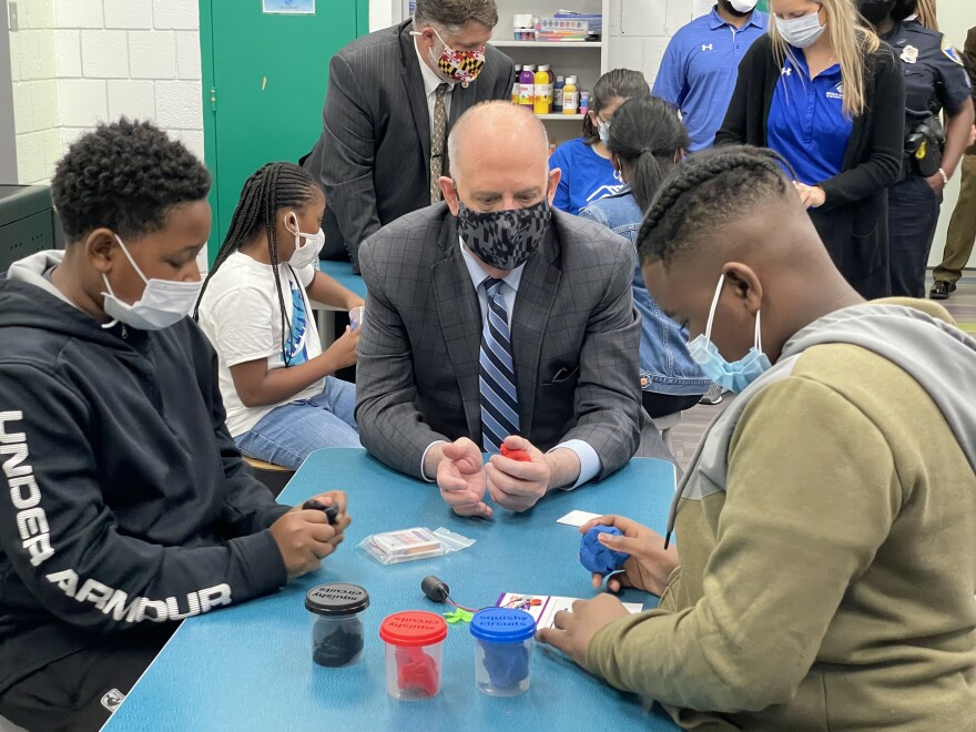 Gov. Larry Hogan participates in a STEM activity at the Webster Kendrick Boys & Girls Club in Northwest Baltimore.