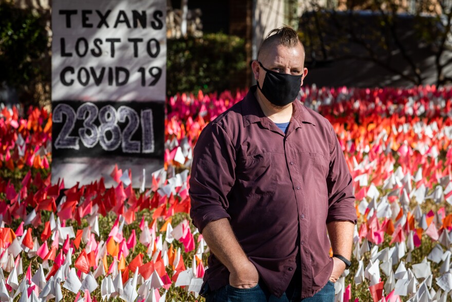 AUSTIN, TX. Dec. 10, 2020. Shane Reilly has turned his front yard into a constantly evolving memorial to Texans that have lost their lives to COVID-19. On Thursday, there were 23,281 flags present. Michael Minasi/KUT