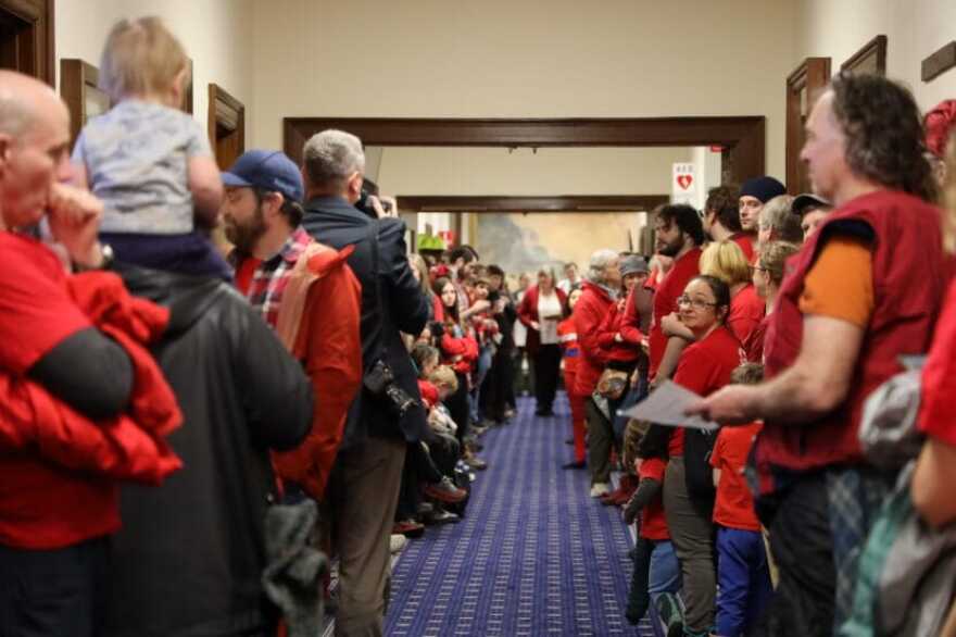 Dozens of Juneau residents and educators lined the halls at the Alaska State Capitol on Monday, March 18, 2024. (Clarise Larson/KTOO)