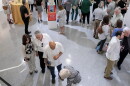 People attending an art exhibition at the Cultural Council for Palm Beach County