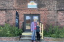 Cornucopia co-owners Nathaniel Clifford [left] and Jade Jump [right] in front of their health and wellness store, which moved to Dwight Street in Holyoke last month.