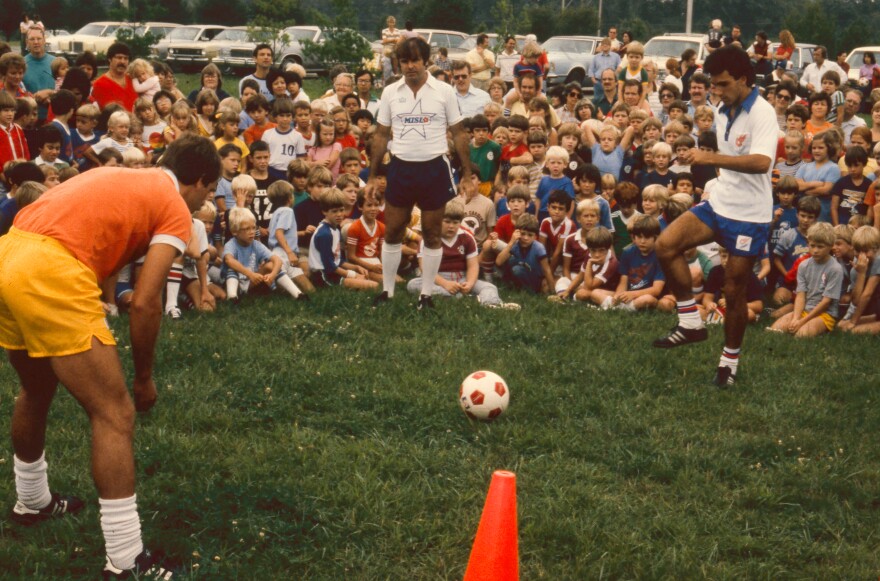The Kansas City Comets team leading a youth soccer workshop.